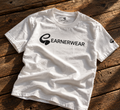 EARNERwear shirt lifestyle flat lay on rustic wood background